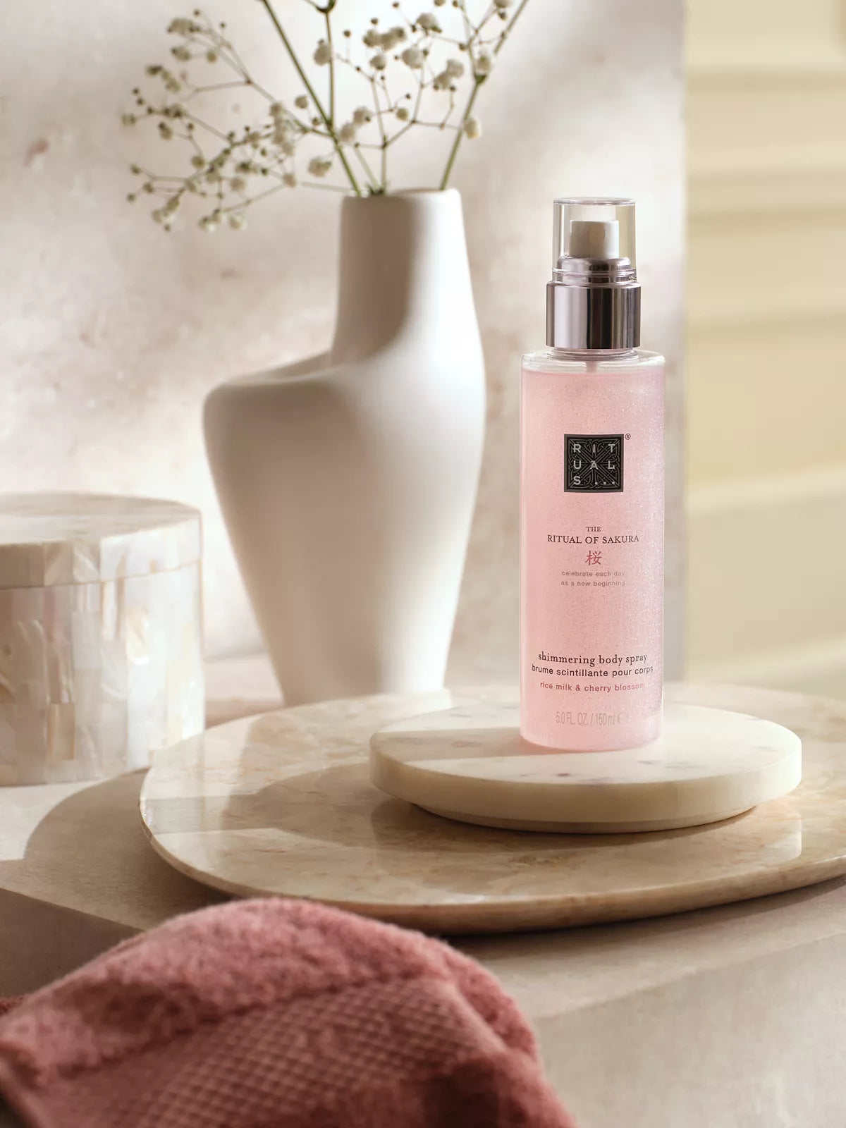 The Ritual of Sakura Shimmering Body Spray 150ml Lifestyle with Product