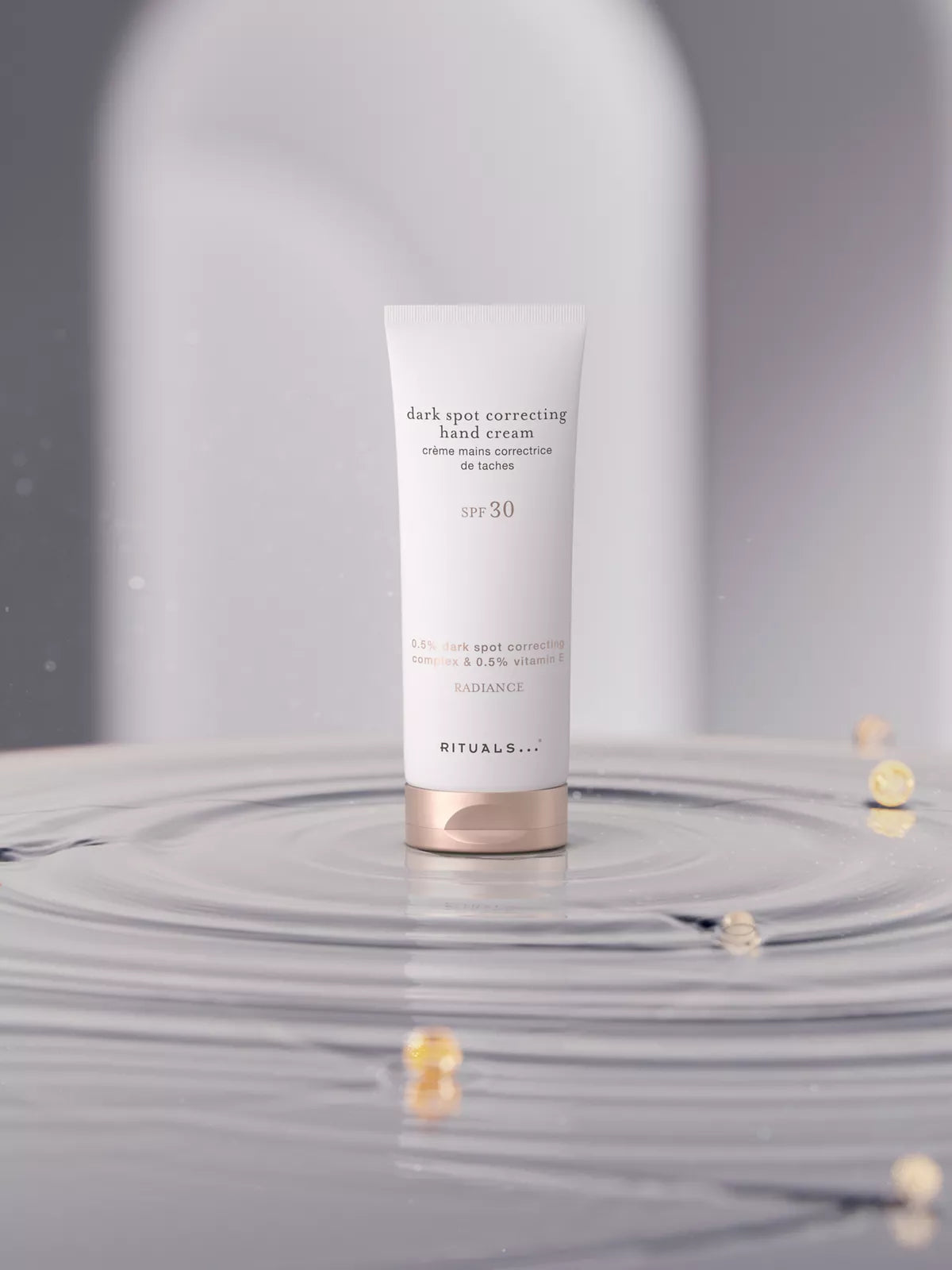 Dark Spot Correcting Hand Cream Lifestyle with Product