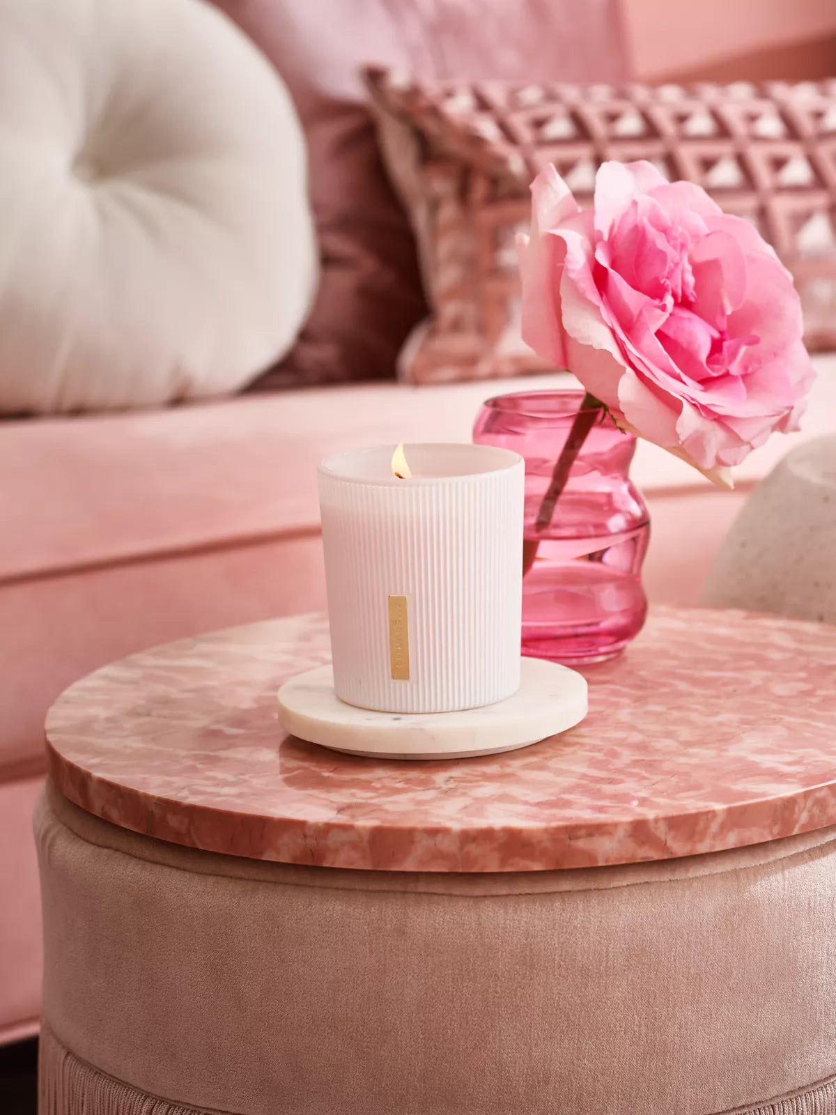 The Ritual of Sakura Scented Candle Lifestyle with Product