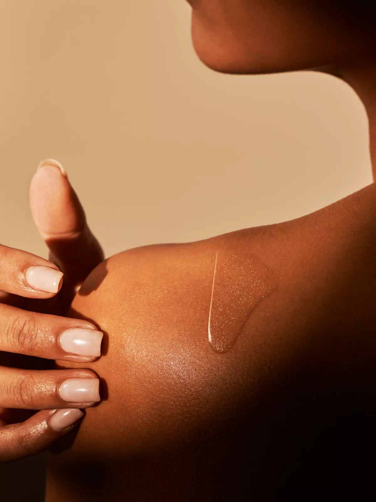 The Ritual of Karma Shimmering Body Oil 100ml Texture on Model
